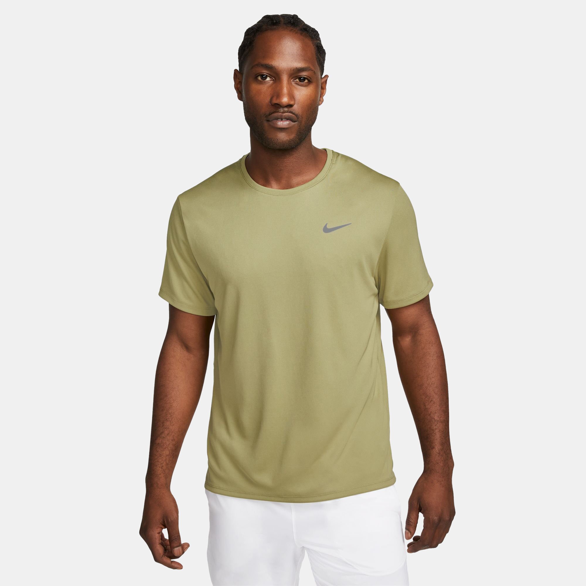 Buy Nike Men s Miler Dri FIT UV Running T Shirt Green in KSA SSS