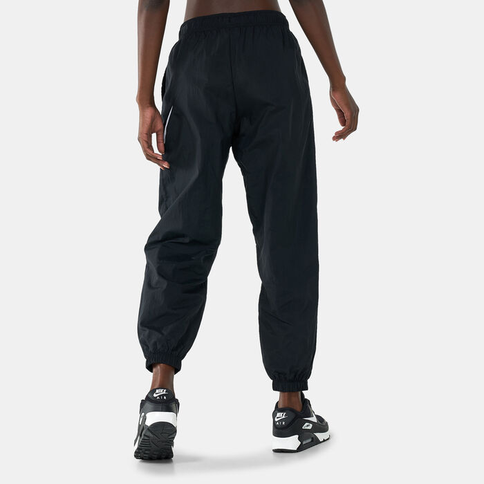Nike Women's Sportswear Essential Easy Woven Sweatpants Black Nike Women's Sportswear Essential Easy Woven Sweatpants Black image number 1