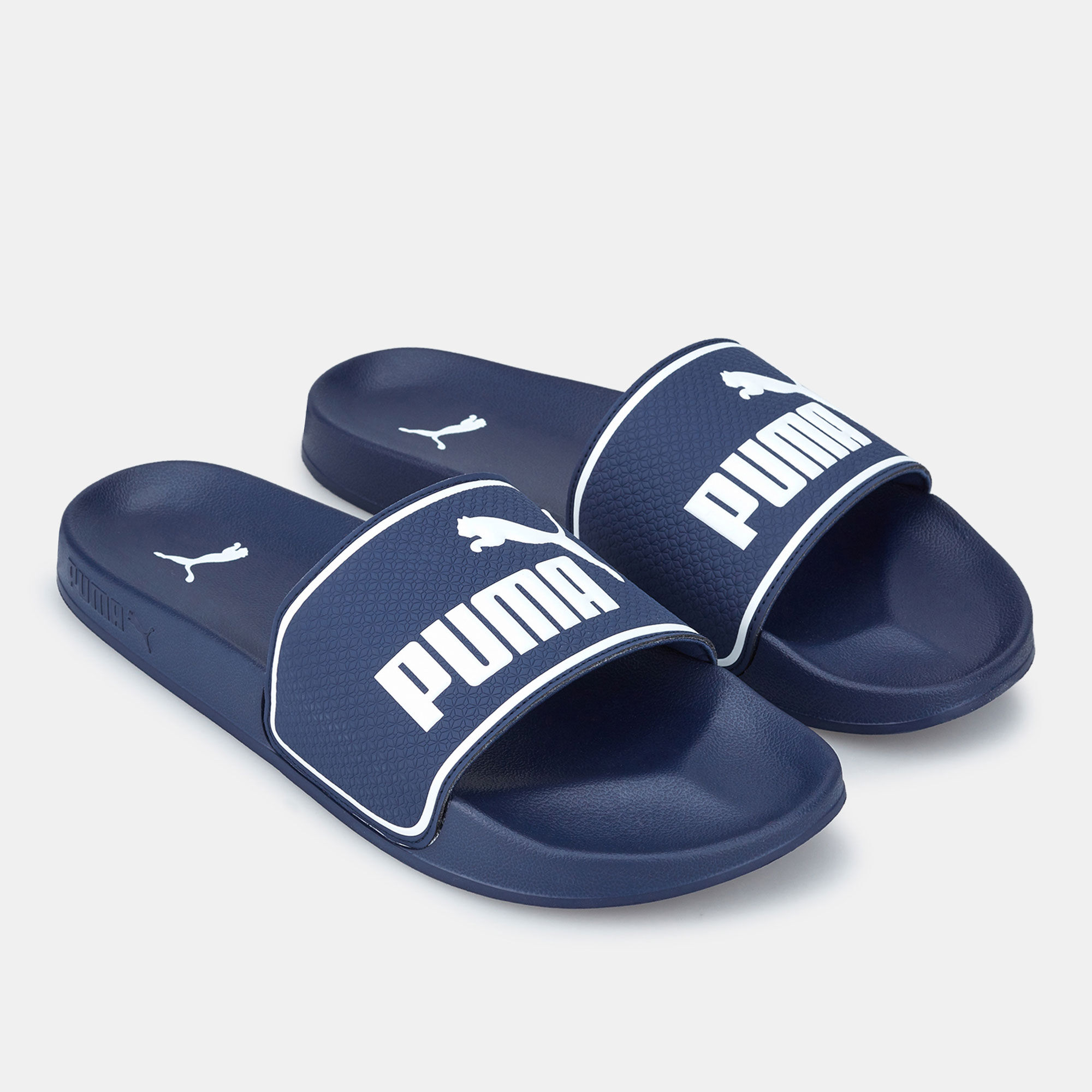 Navy blue puma slides store