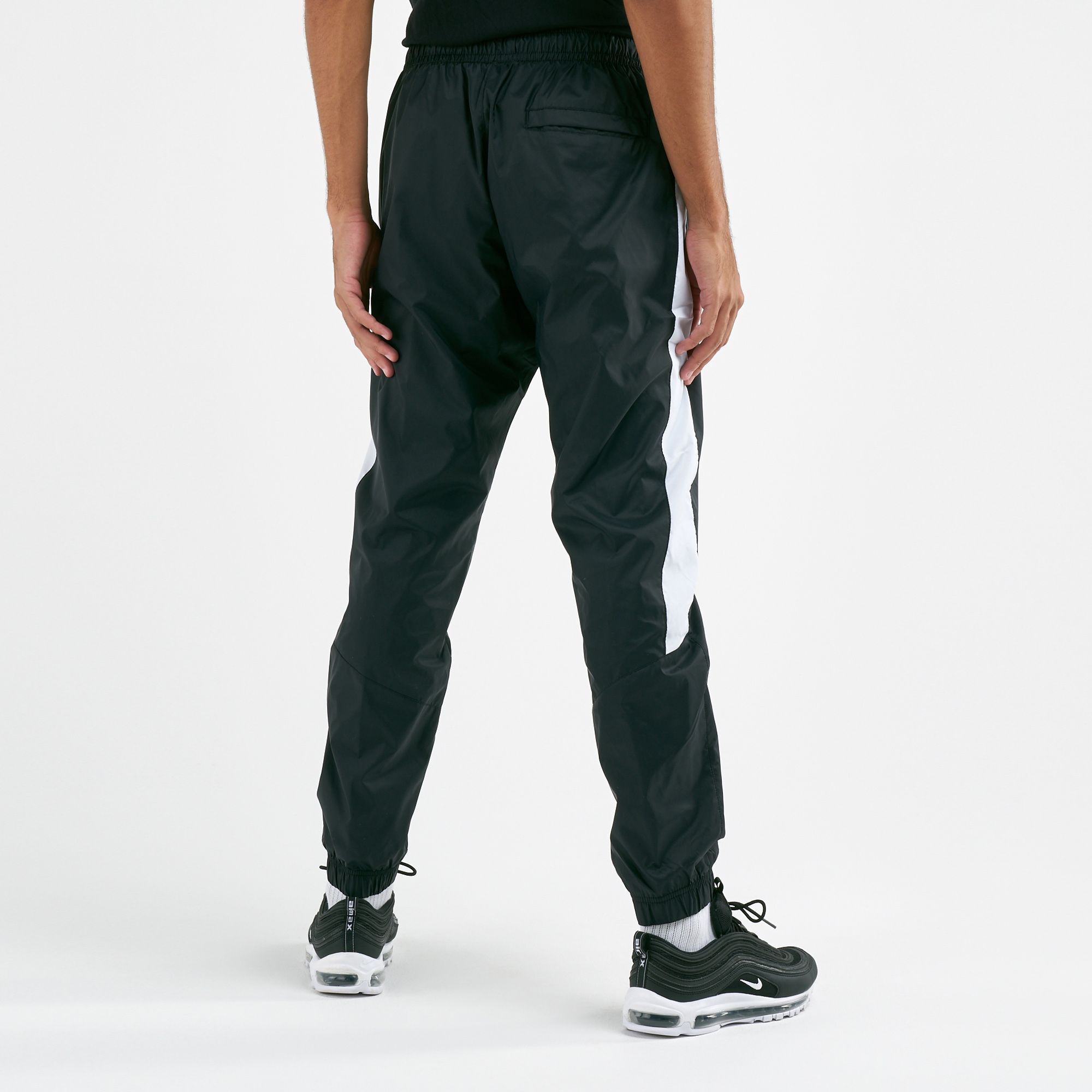Nike nsw woven track hotsell pants