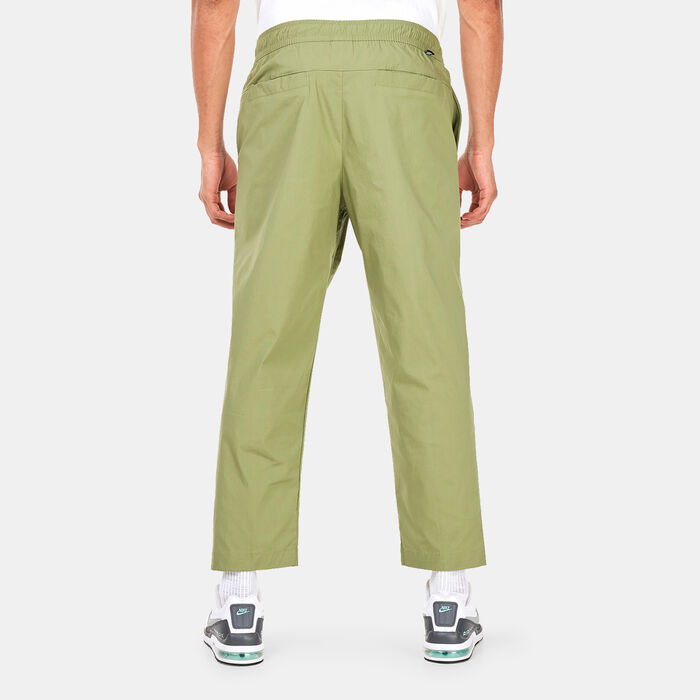 Nike Men's Sportswear Sport Essentails Woven Unlined Sneaker Pants Green Nike Men's Sportswear Sport Essentails Woven Unlined Sneaker Pants Green image number 1