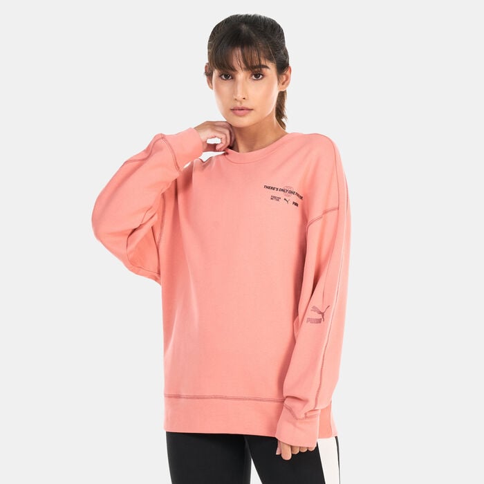 PUMA Women's Classics RE:ESCAPE Crewneck Sweater Pink PUMA Women's Classics RE:ESCAPE Crewneck Sweater Pink image number 0