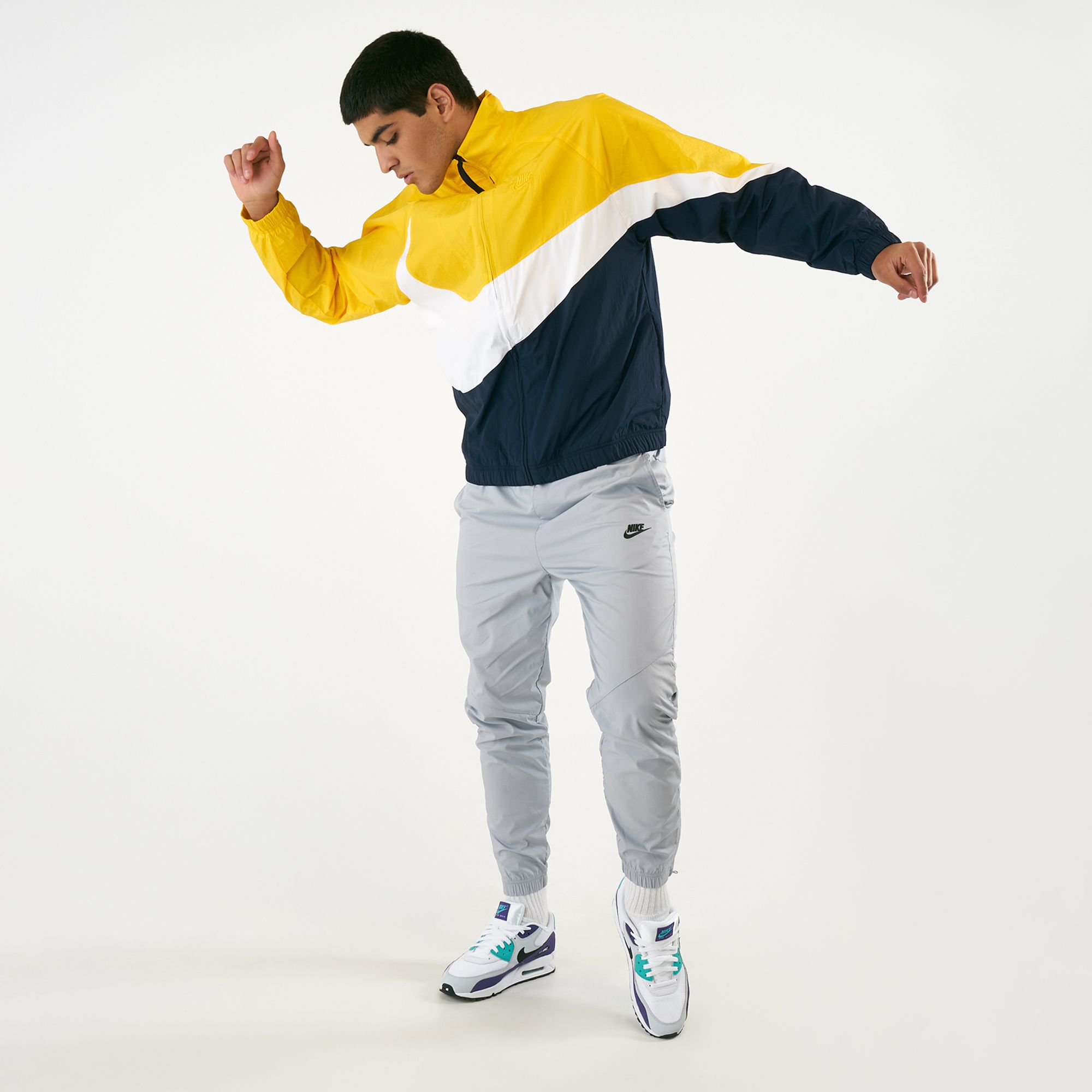 Nike big on sale swoosh jacket yellow