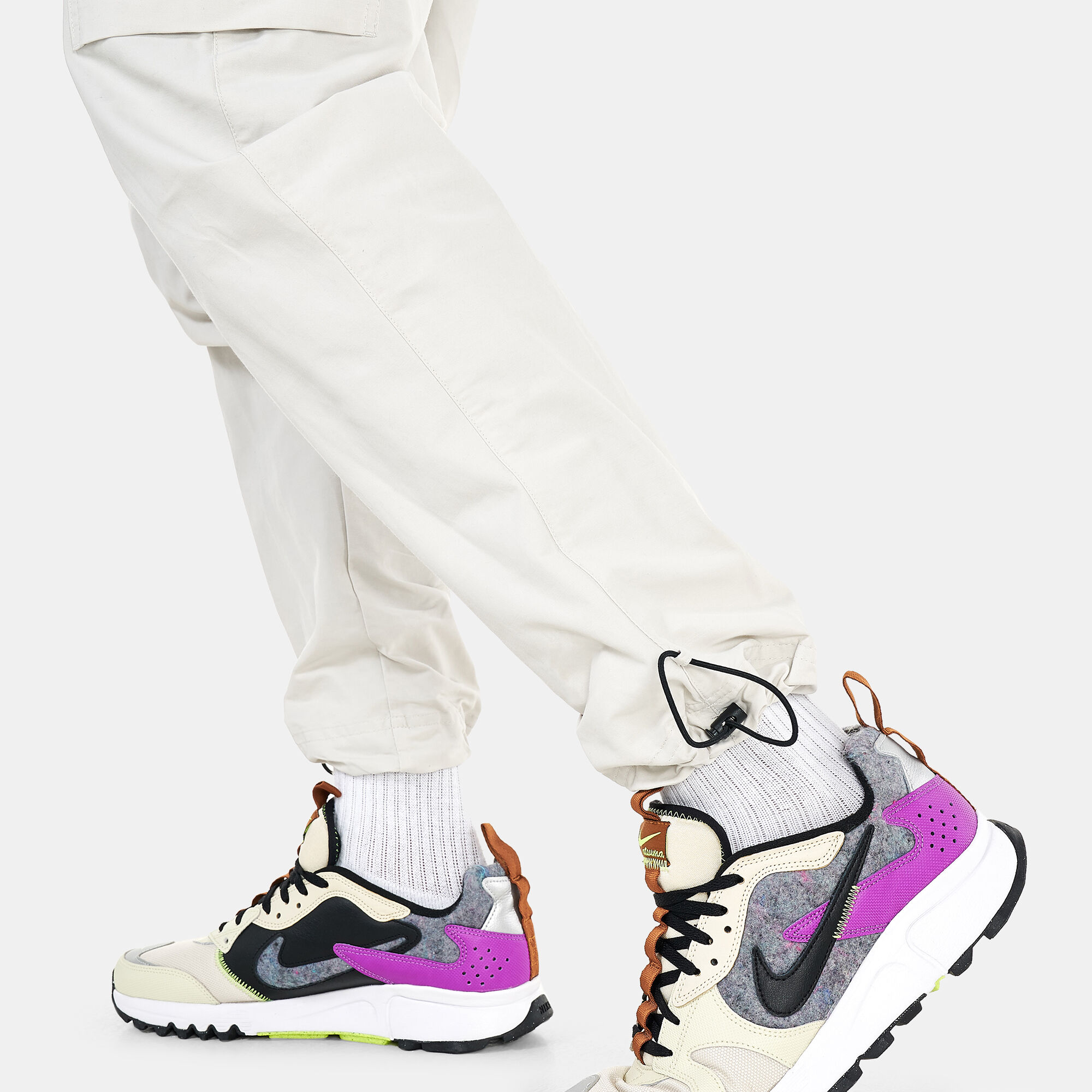 Buy Nike Men s Sportswear Repeat Woven Pants White in KSA SSS