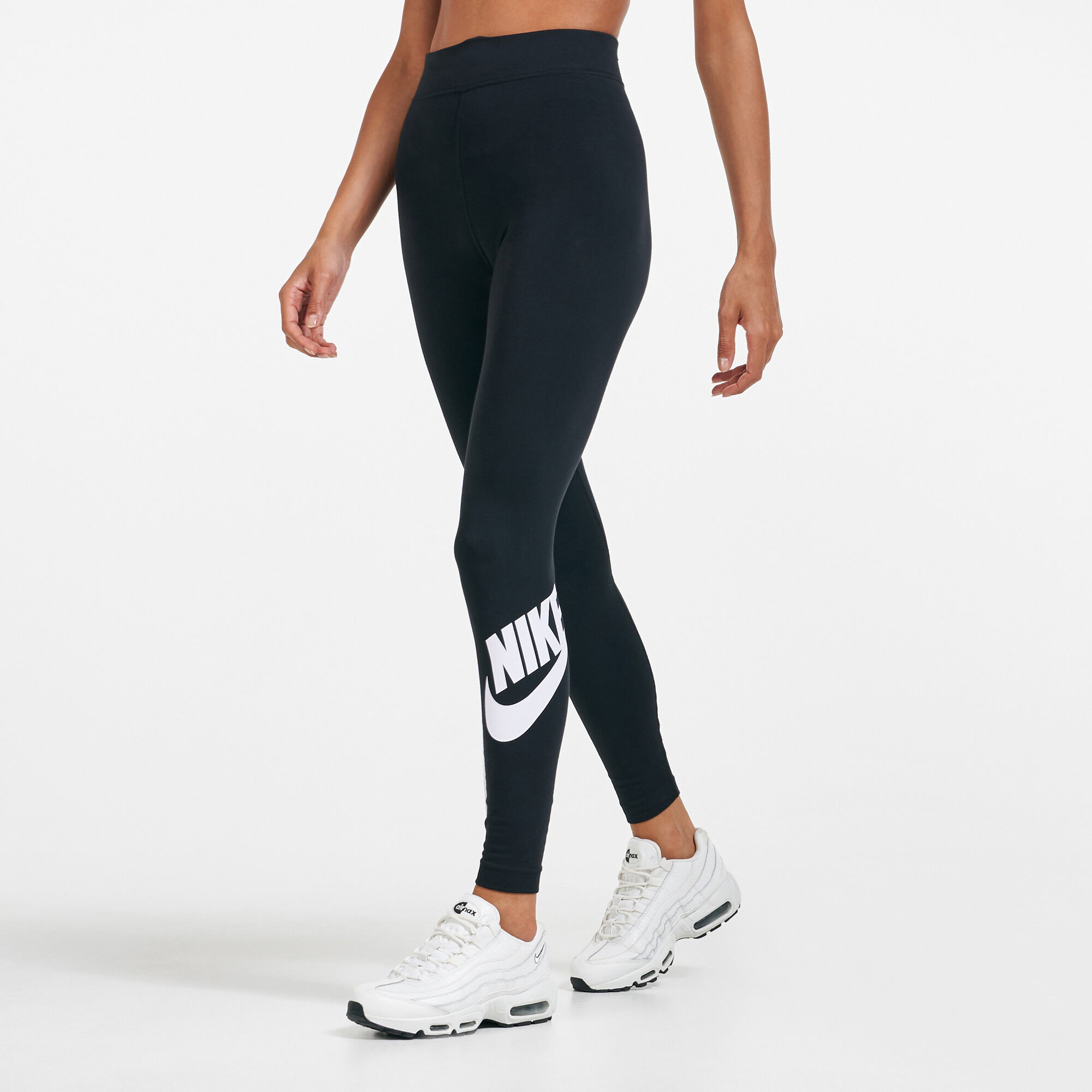 Buy Nike Women s Sportswear Essential Futura Leggings Black in KSA