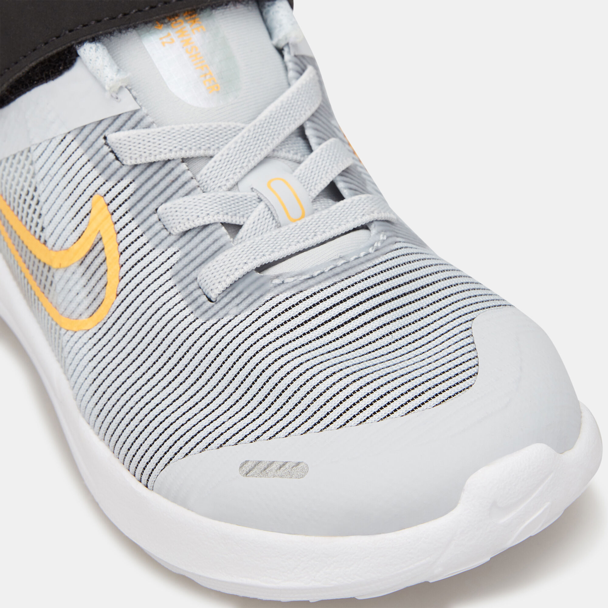 Buy Nike Kids Downshifter 12 Shoe Baby and Toddler Grey in KSA SSS