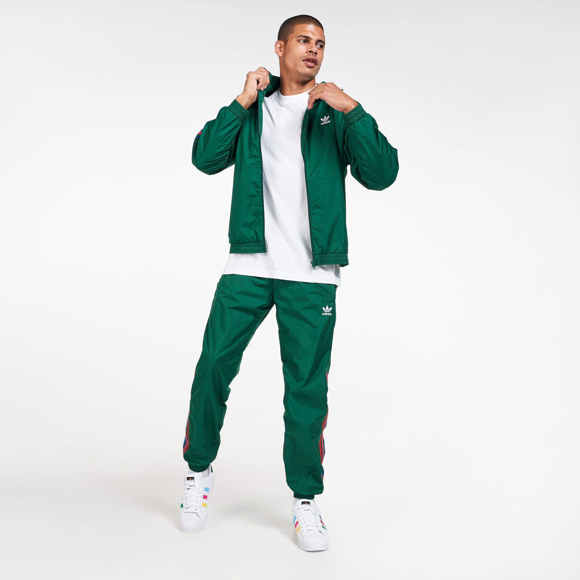 Adidas originals adicolor three stripe track jacket in green sales