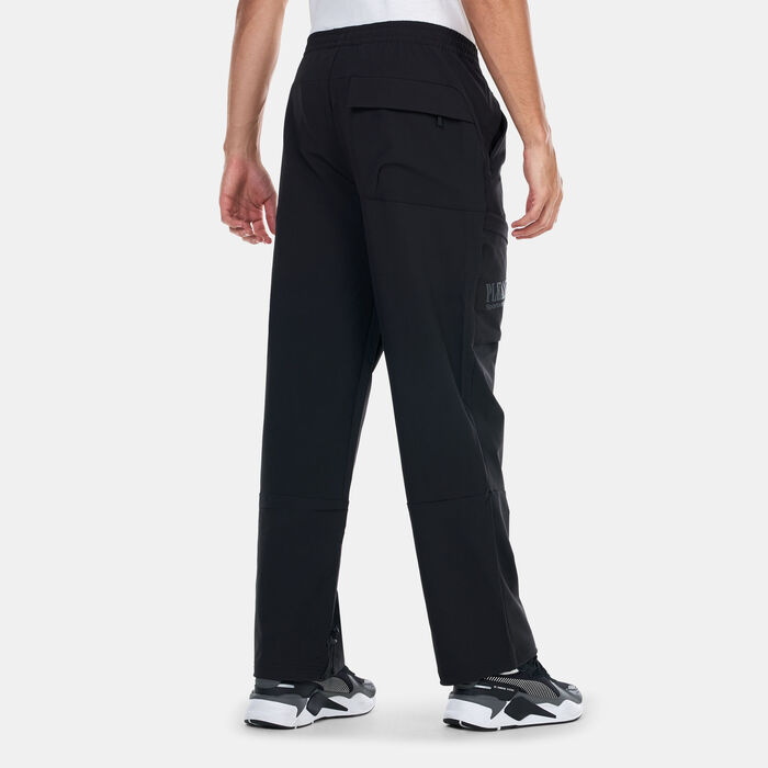 PUMA Men's x PLEASURES Cargo Pants Black PUMA Men's x PLEASURES Cargo Pants Black image number 1
