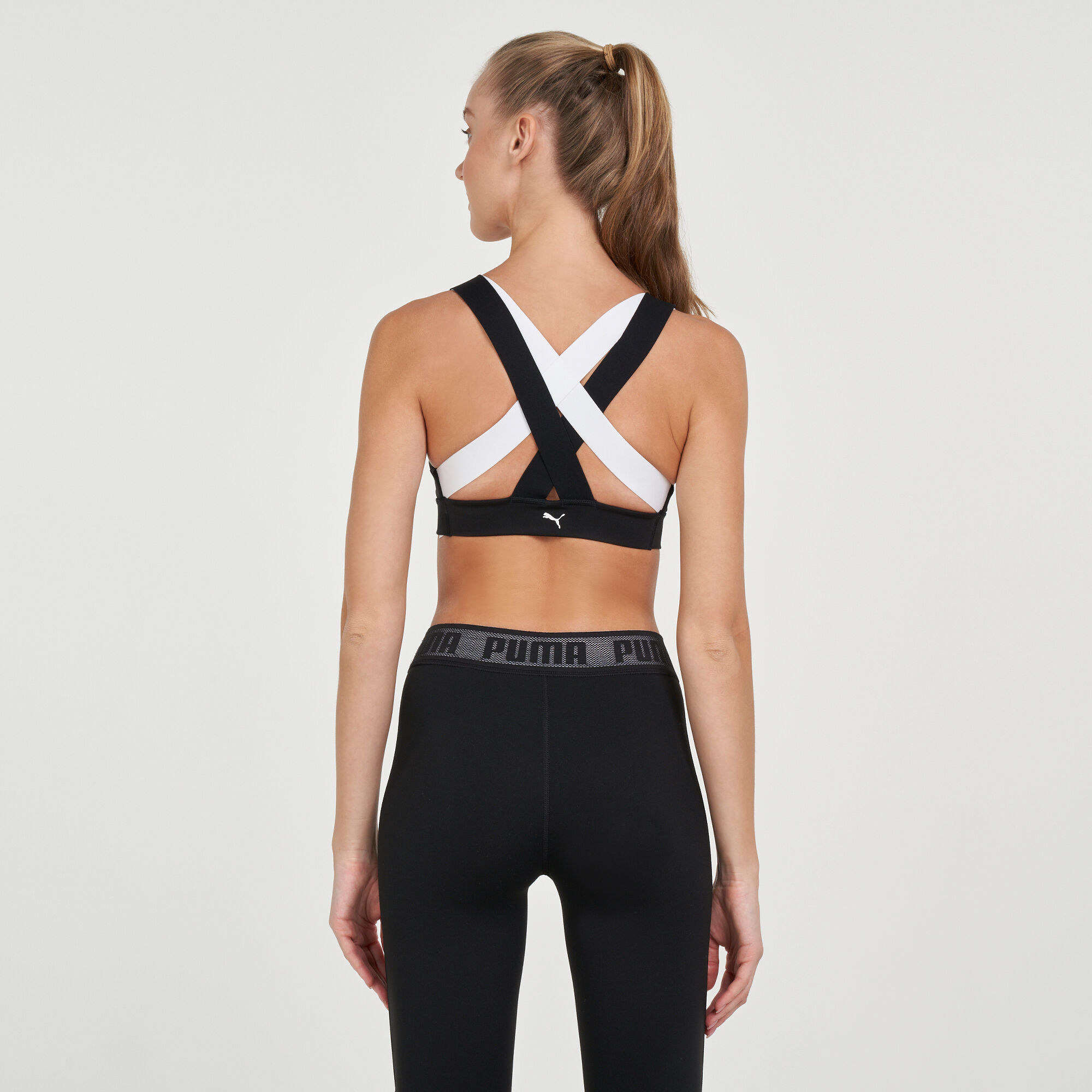 Buy Puma Women s Feel It Logo Sports Bra Black in KSA SSS