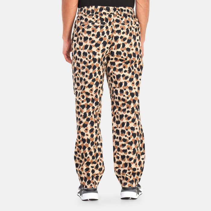 PUMA Men's DOWNTOWN Printed Woven Pants Brown PUMA Men's DOWNTOWN Printed Woven Pants Brown image number 1