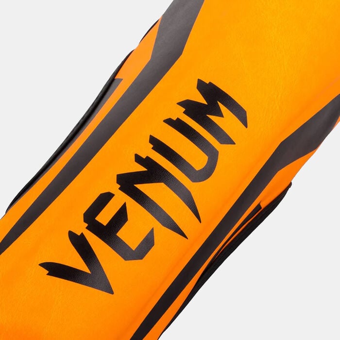 Venum Kids' Elite Shin Guards Orange Venum Kids' Elite Shin Guards Orange image number 1