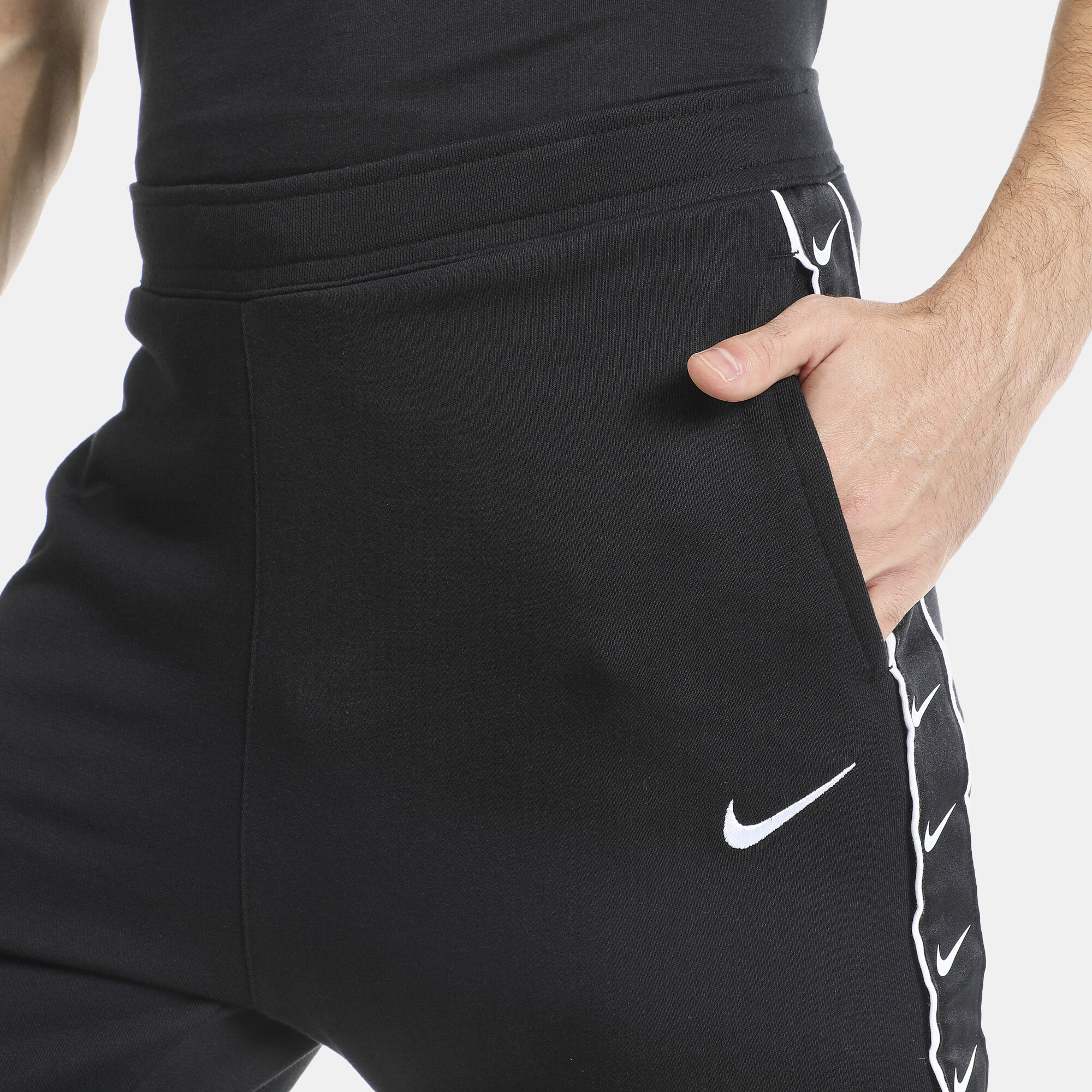 Black swoosh hotsell joggers
