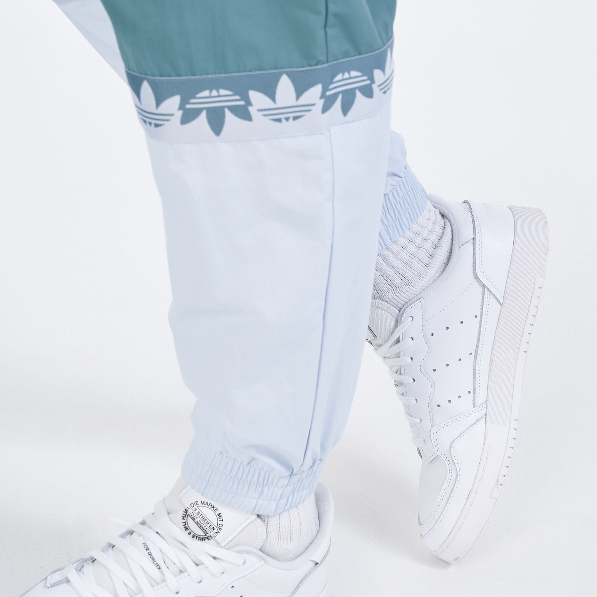 Men s Adicolor Sliced Trefoil Track Pants
