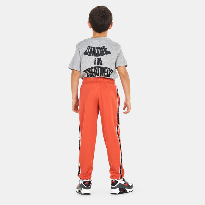 Nike Kids' Sportwear Repeat Graphic Joggers Red Nike Kids' Sportwear Repeat Graphic Joggers Red image number 1