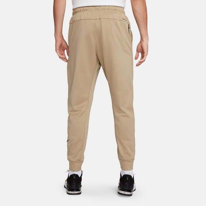 Nike Men's Tech-Fleece Tapered Joggers Beige Nike Men's Tech-Fleece Tapered Joggers Beige image number 1