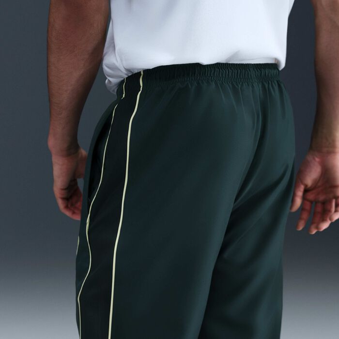 Nike Men's Academy+ Repel Soccer Woven Pants Green image number 2