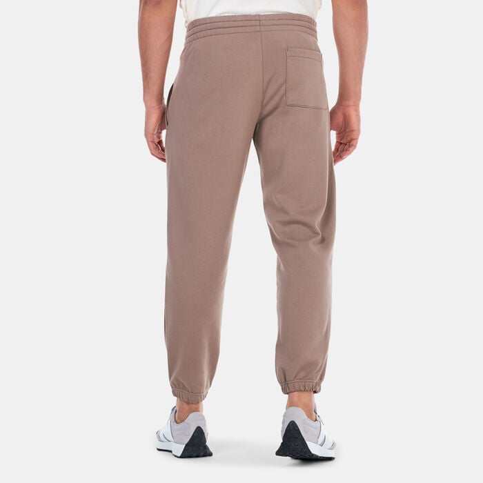 New Balance Men's Athletics Linear Pants Brown New Balance Men's Athletics Linear Pants Brown image number 1