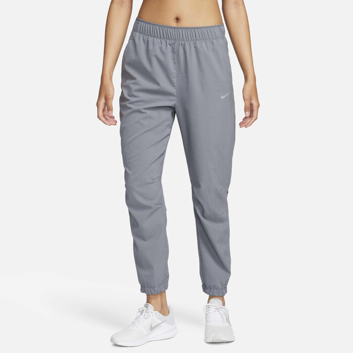Nike Women's Dri-FIT Fast Mid-Rise Warm-Up Running Trousers Grey image number 0