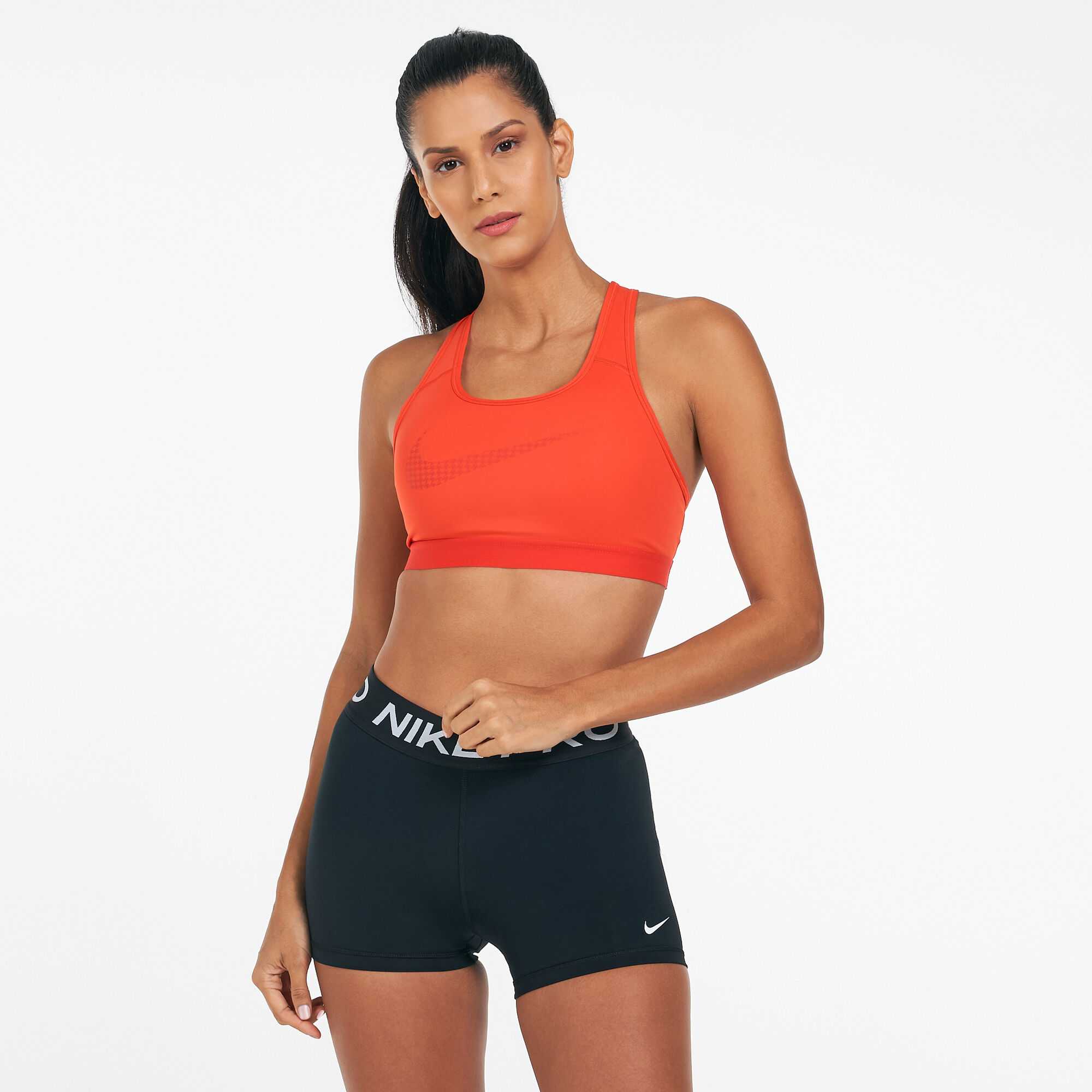 Buy Nike Women's Dri-FIT Swoosh Icon Clash Sports Bra Red in KSA -SSS