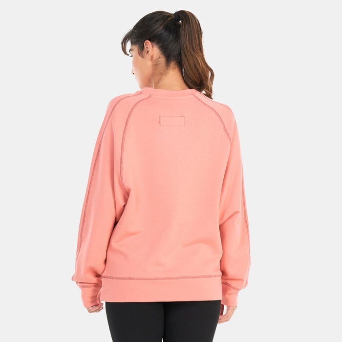 PUMA Women's Classics RE:ESCAPE Crewneck Sweater Pink PUMA Women's Classics RE:ESCAPE Crewneck Sweater Pink image number 1