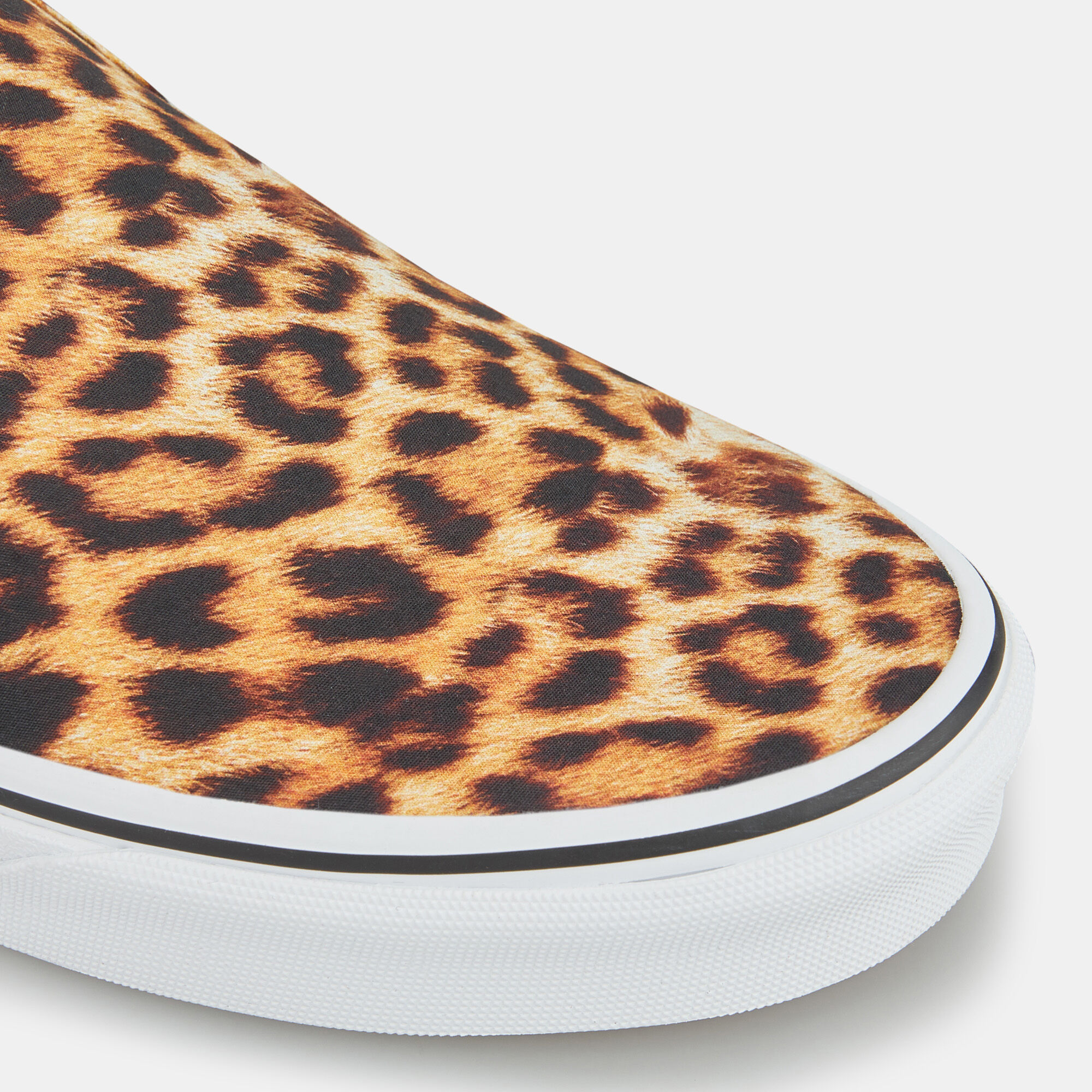 Leopard print discount van slip ons