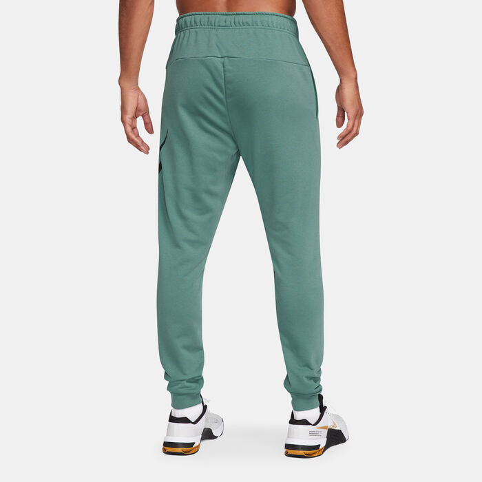 Nike Men's Dri-FIT Dry Graphic Tapered Training Pants Green Nike Men's Dri-FIT Dry Graphic Tapered Training Pants Green image number 1