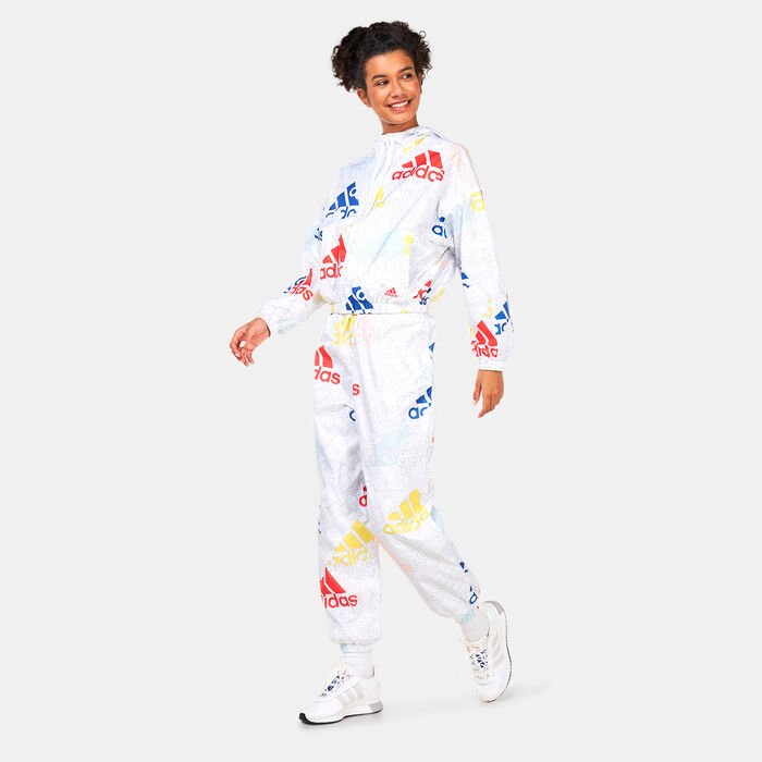 adidas Women's Essentials Multi-Coloured Logo Loose Fit Woven Pants White adidas Women's Essentials Multi-Coloured Logo Loose Fit Woven Pants White image number 2