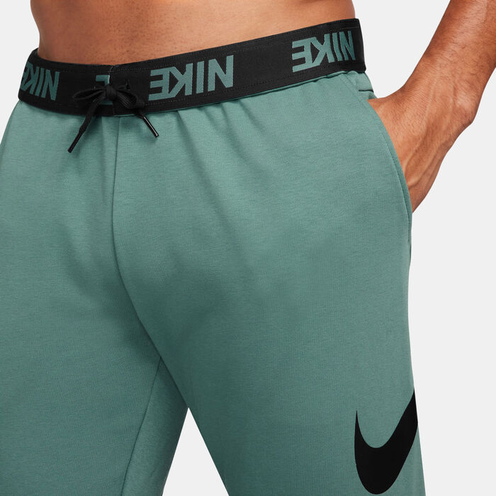 Nike Men's Dri-FIT Dry Graphic Tapered Training Pants Green Nike Men's Dri-FIT Dry Graphic Tapered Training Pants Green image number 2