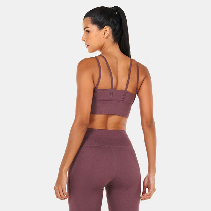 PUMA Women's Mid Impact Flawless Training Sports Bra Brown image number 1