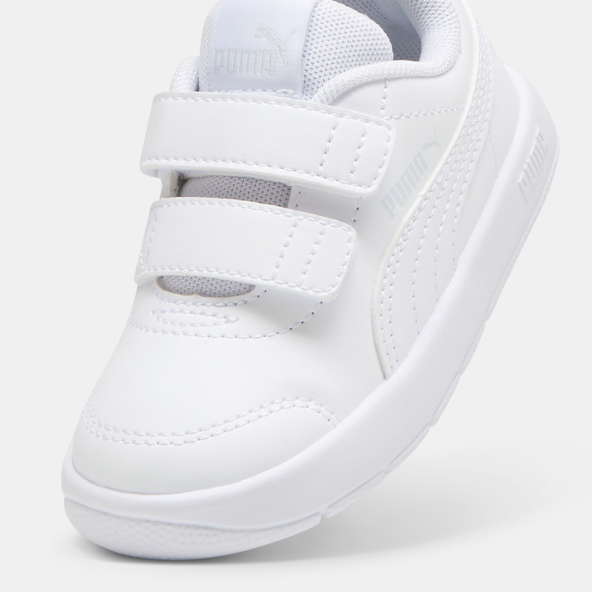 White puma velcro shoes top