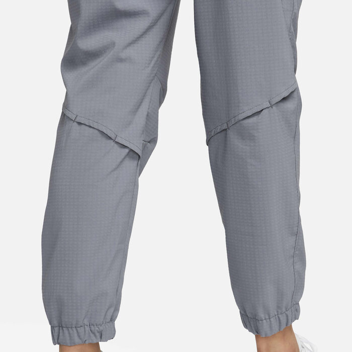 Nike Women's Dri-FIT Fast Mid-Rise Warm-Up Running Trousers Grey image number 4