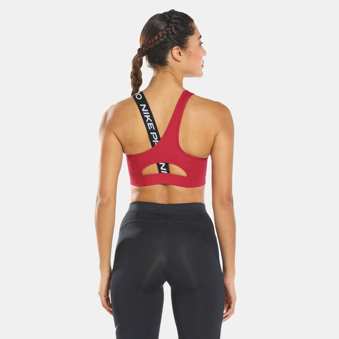 Buy Nike Women's Pro Dri-FIT Swoosh Asymmetric Sports Bra Red in KSA -SSS
