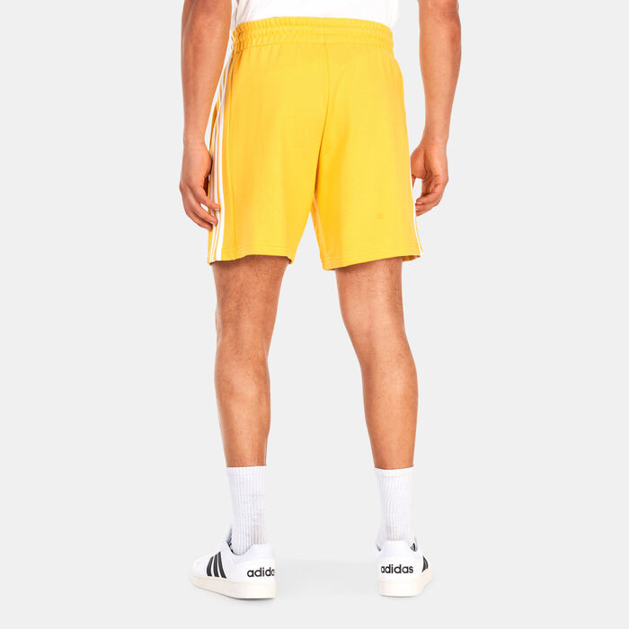 adidas Men's Essentials French Terry 3-Stripes Shorts yellow adidas Men's Essentials French Terry 3-Stripes Shorts yellow image number 1