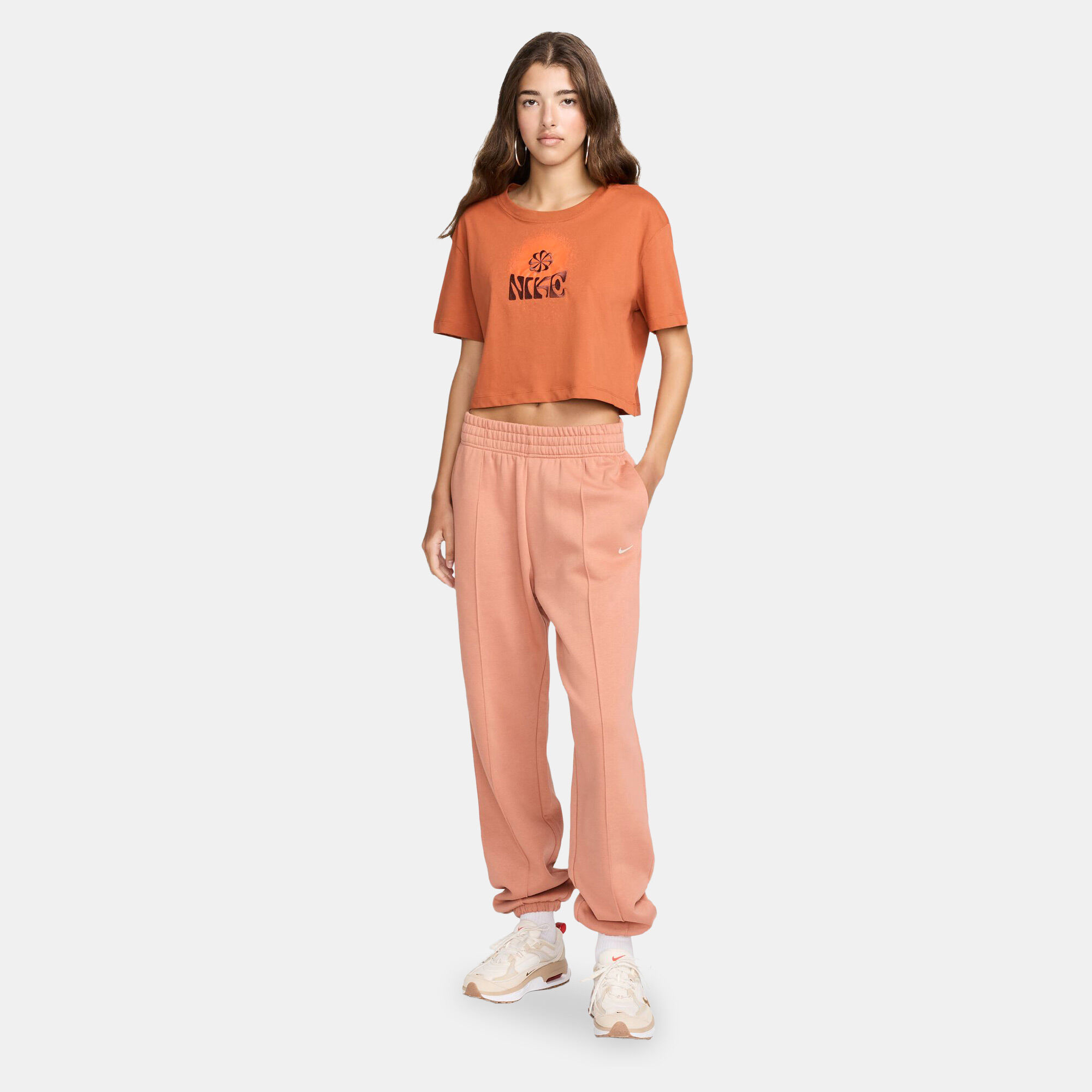 Peach nike sweatpants cheap