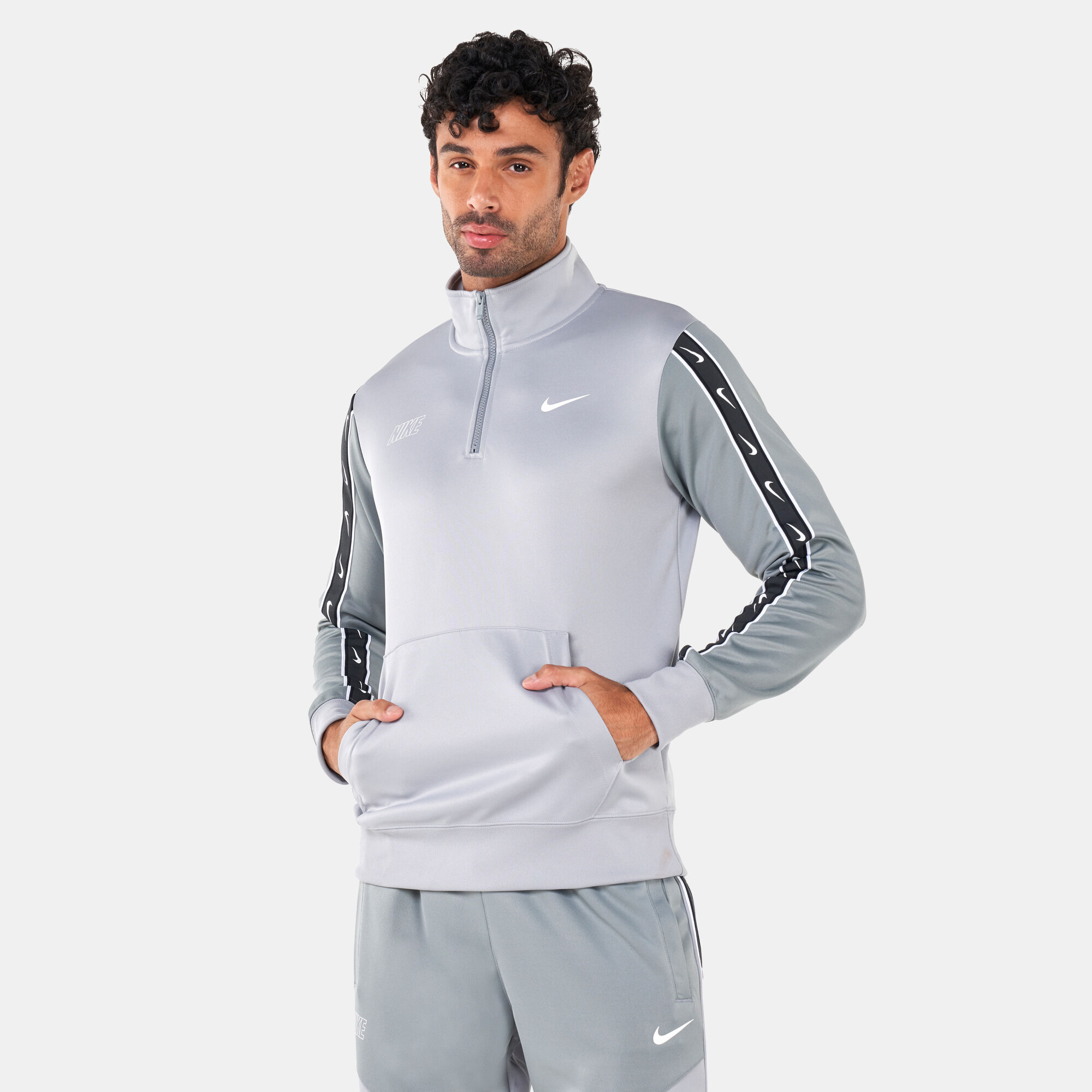 Nike tracksuit half zip online