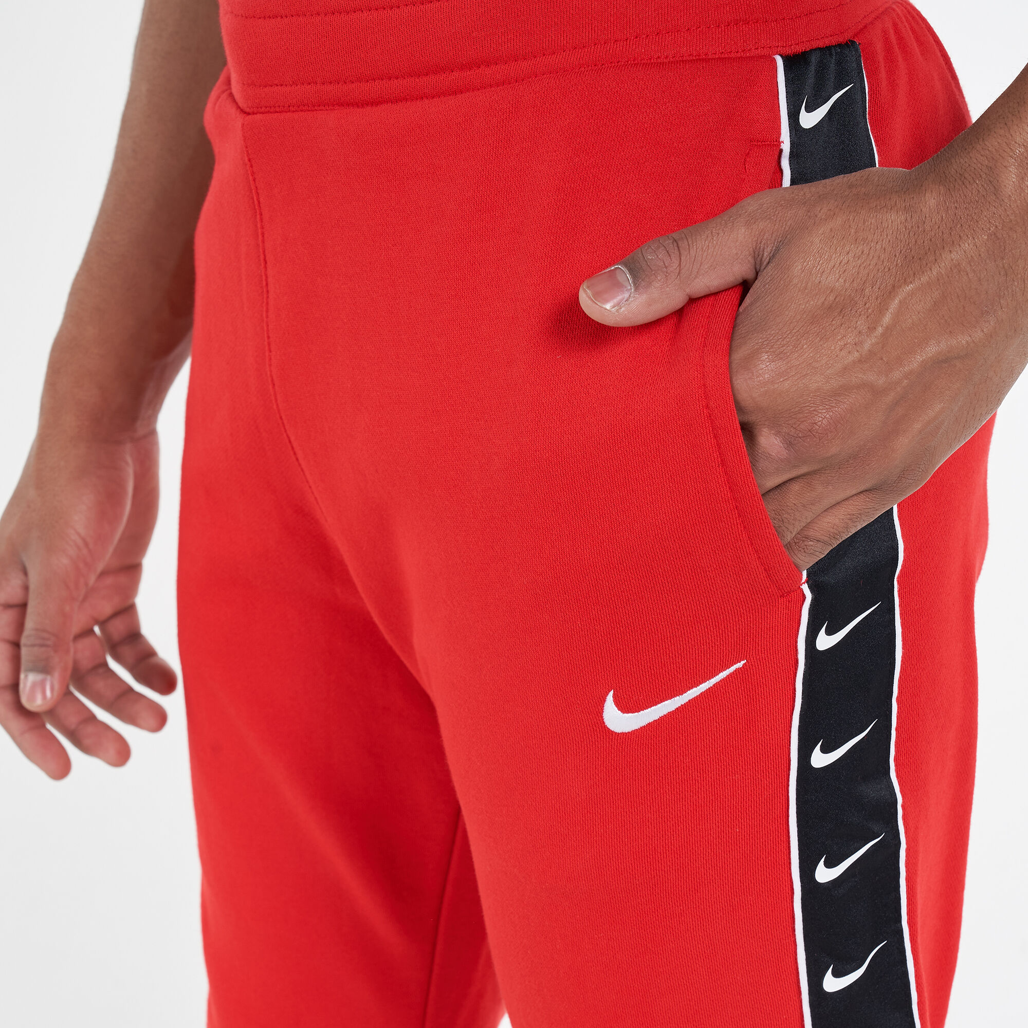Nike tape track pants red top