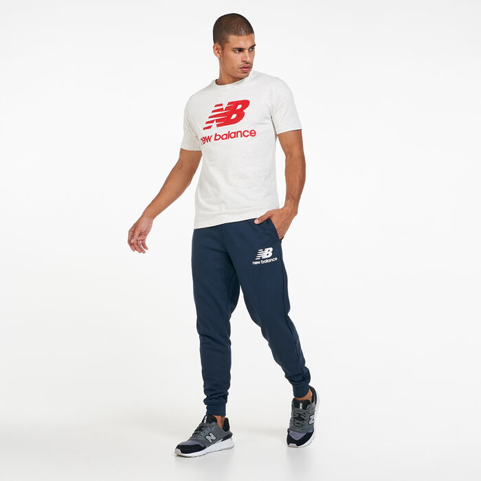 Buy New Balance Men's Essentials Stacked Logo Sweatpants Blue in KSA -SSS