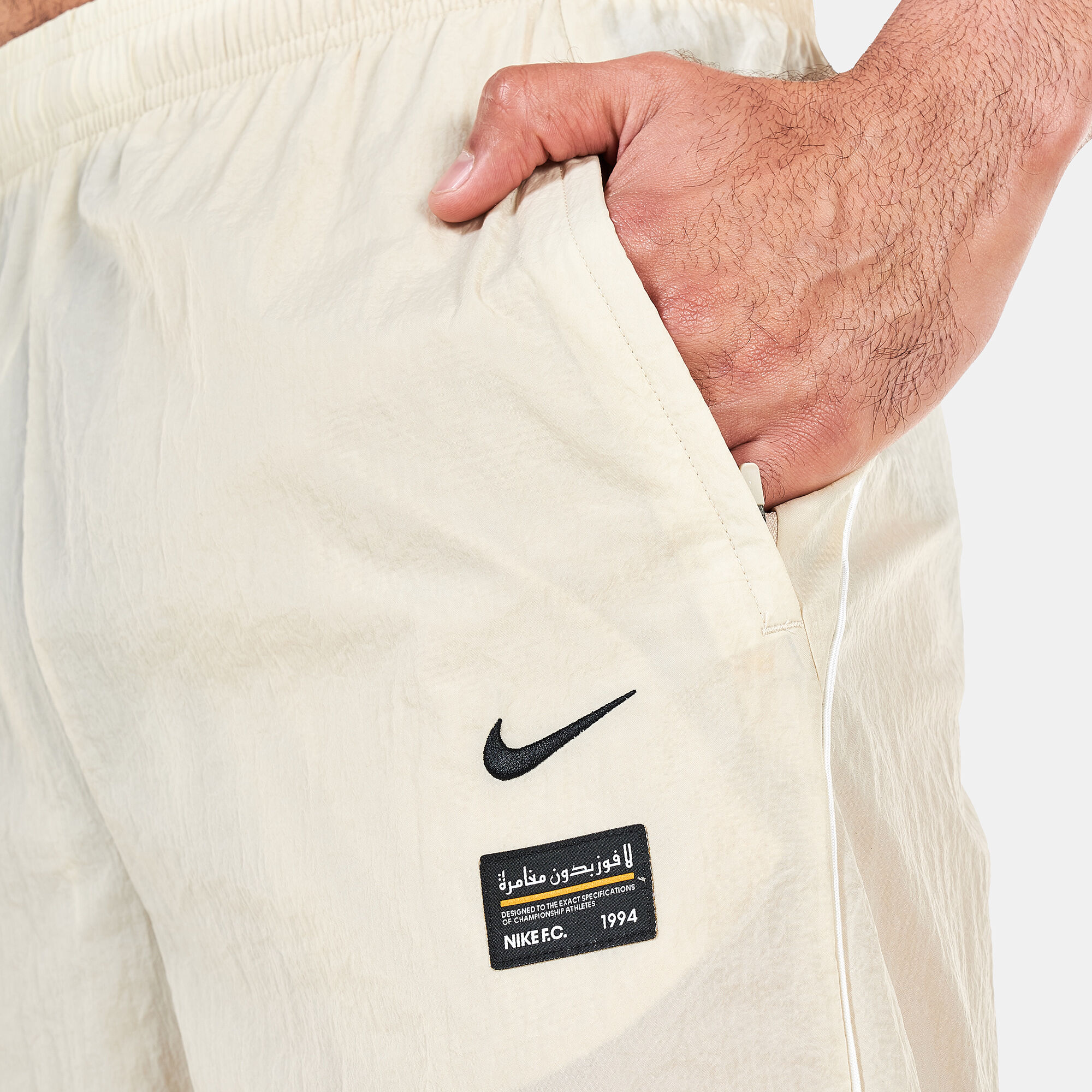 Buy Nike Men s F.C. Repel Woven Football Joggers Beige in KSA SSS