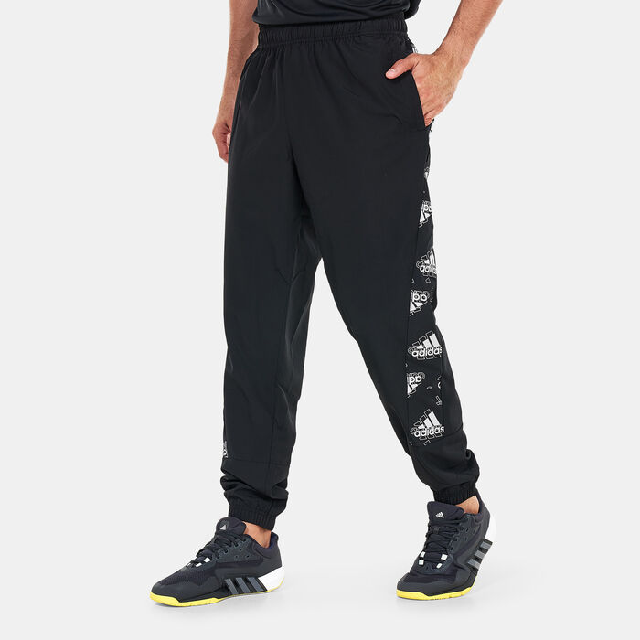 adidas Men's Woven Allover Print Tracksuit Black adidas Men's Woven Allover Print Tracksuit Black image number 1
