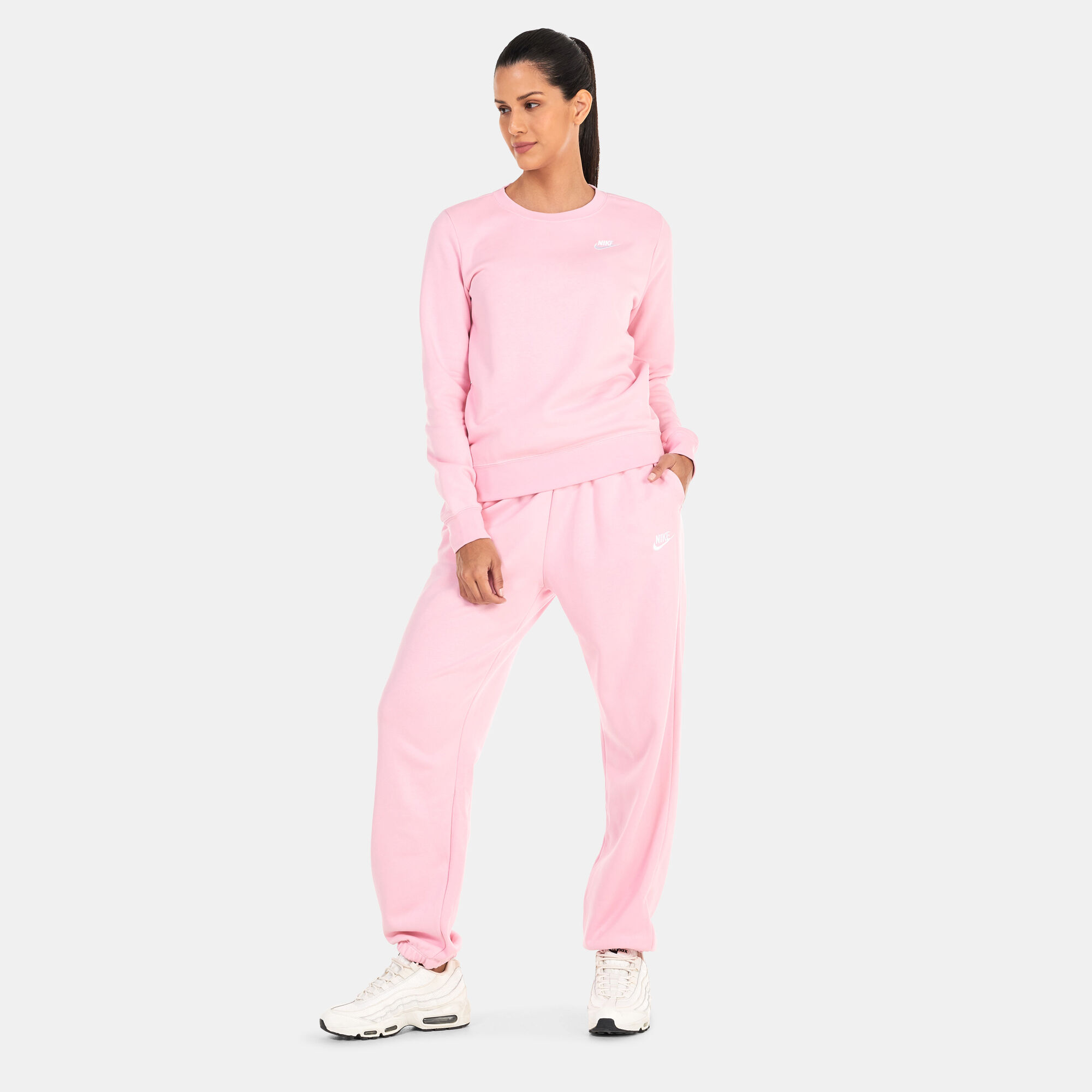 Womens pink 2025 nike tracksuit
