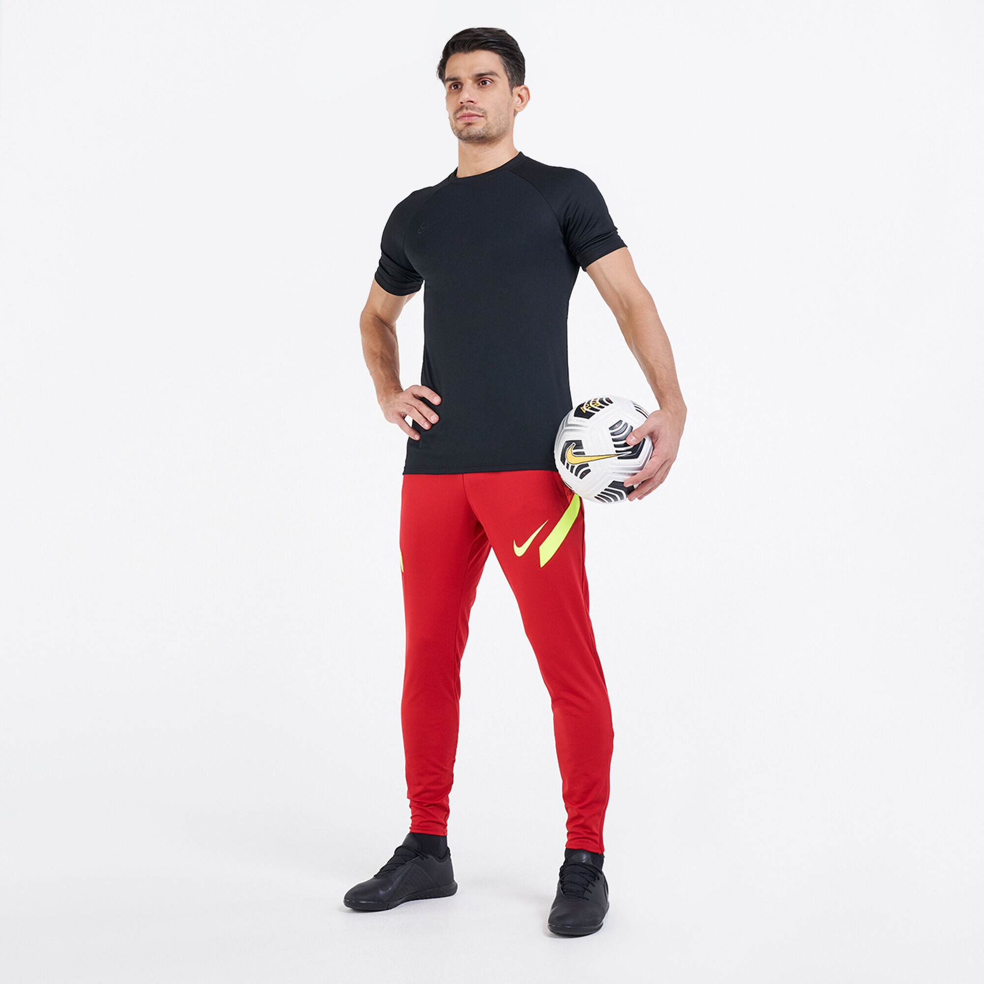 Red nike track pants on sale