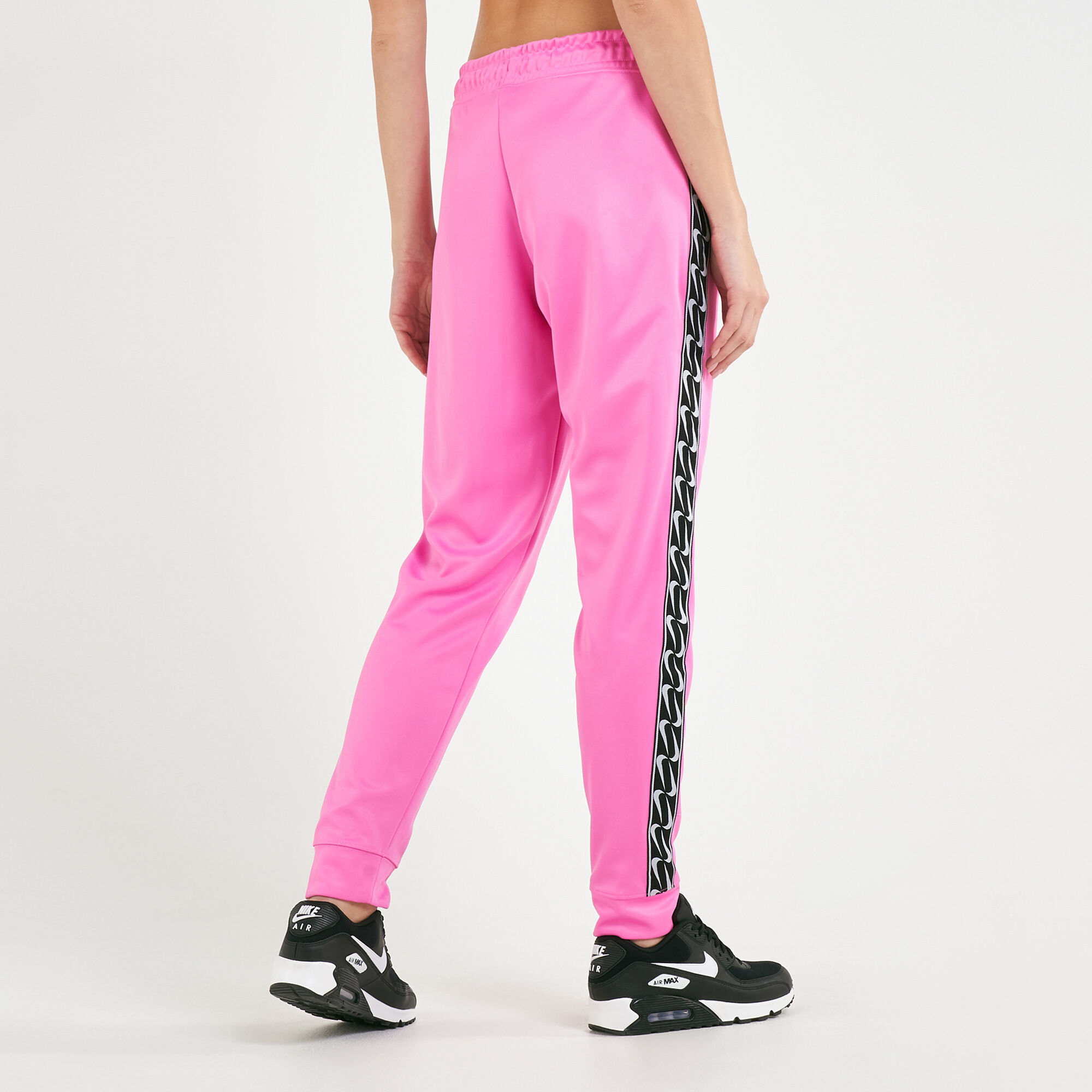 Nike swoosh joggers best sale pink