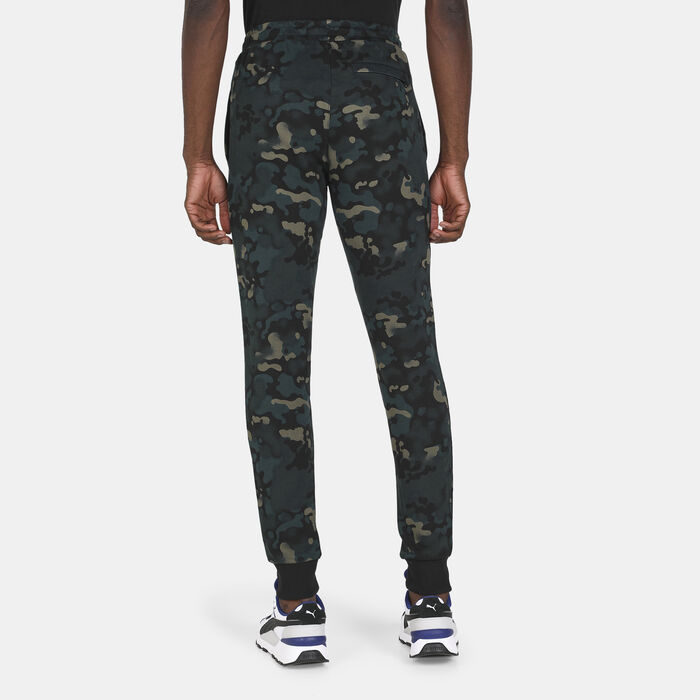 PUMA Men's Classics Camo Allover Print Pants Green PUMA Men's Classics Camo Allover Print Pants Green image number 1