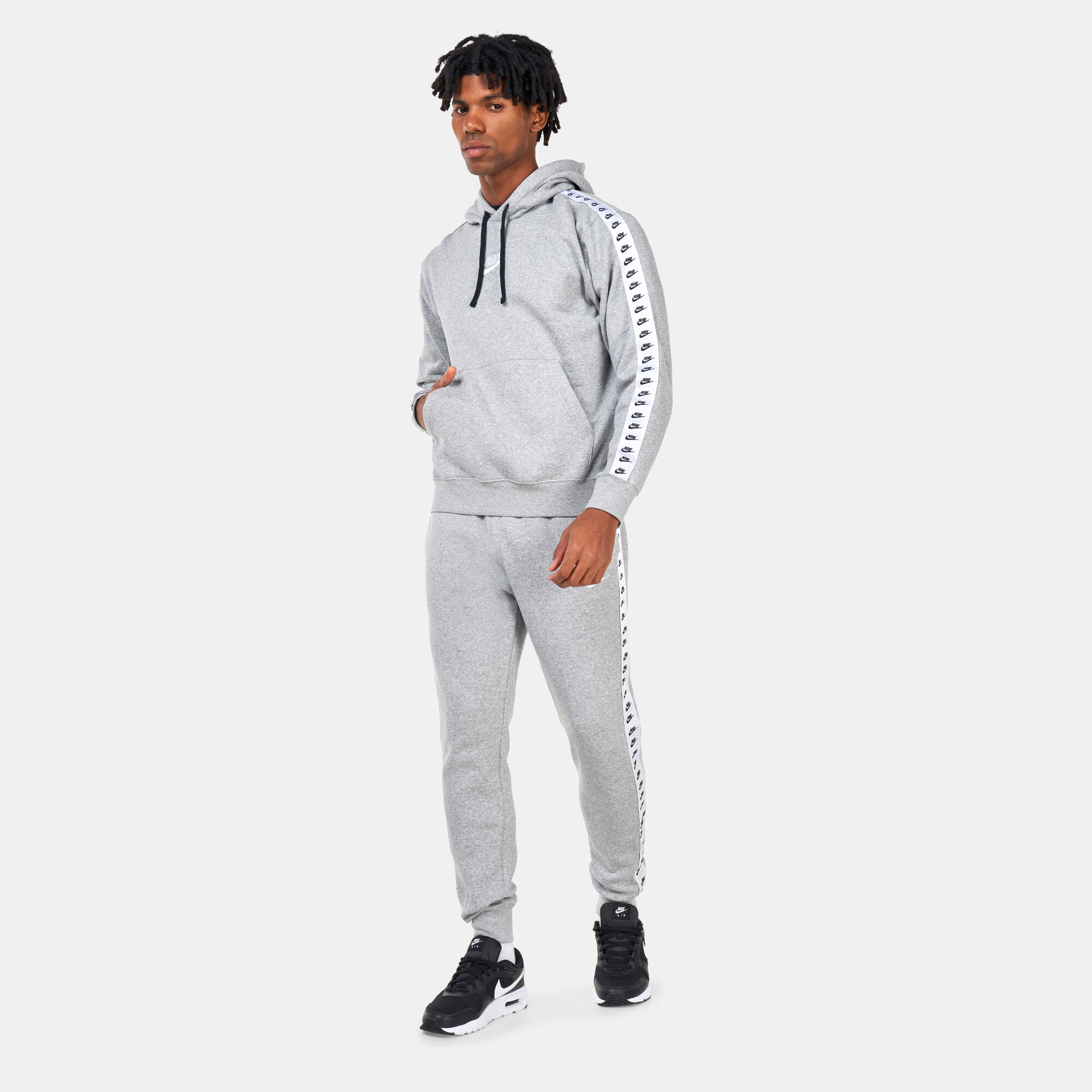 Nike tape hotsell fleece tracksuit