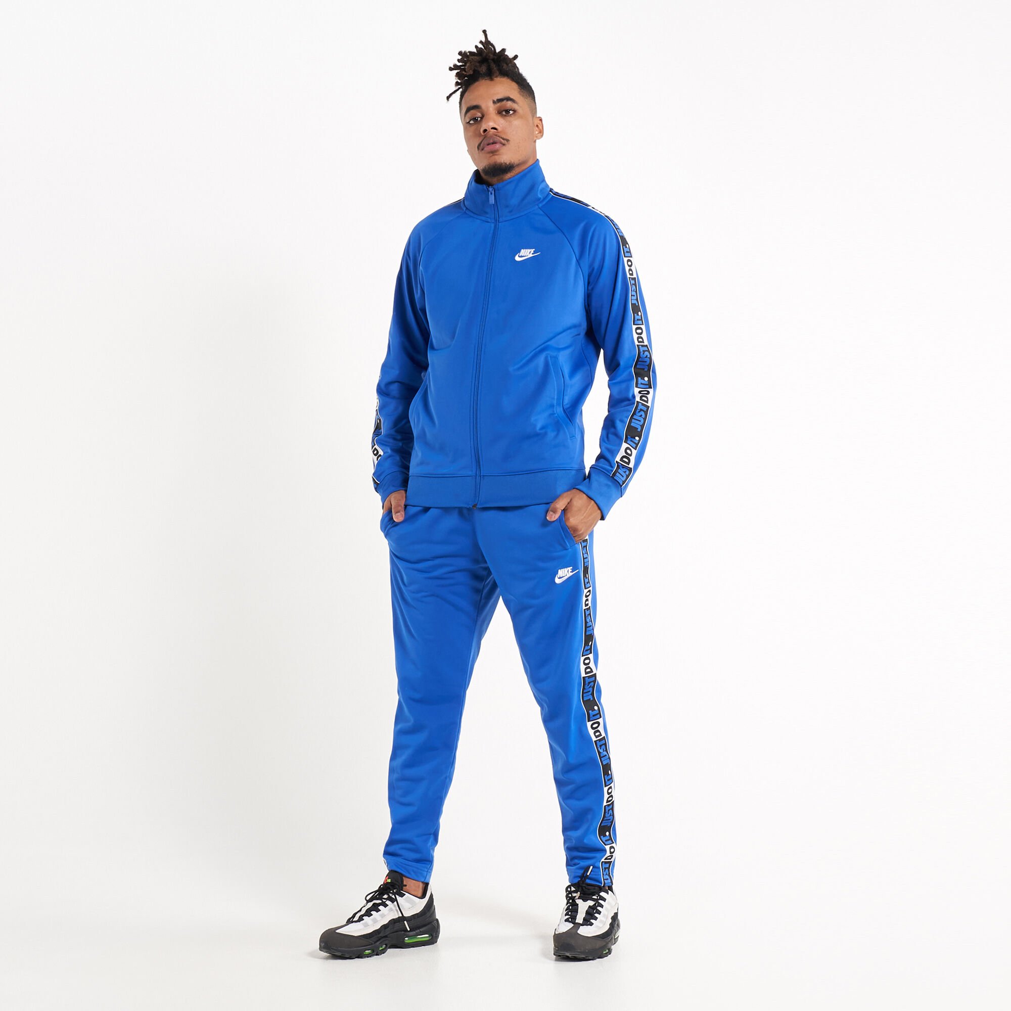 Nike taped tracksuit blue store