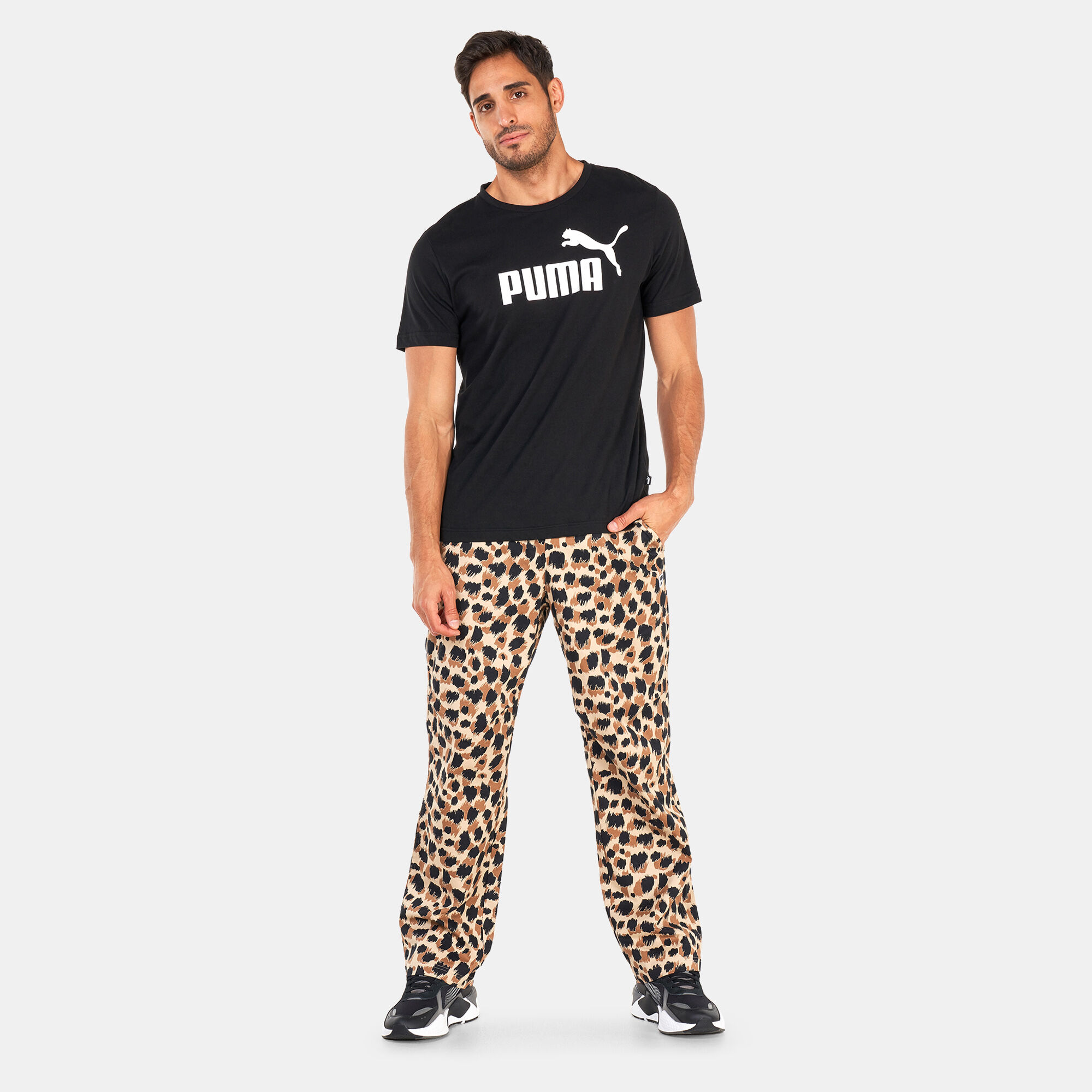 Buy PUMA Men s DOWNTOWN Printed Woven Pants Brown in KSA SSS
