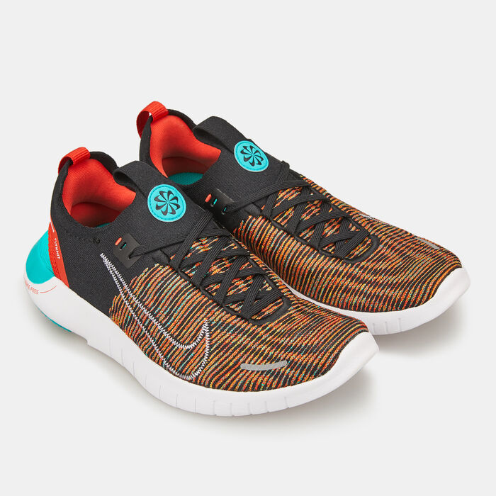 Nike Women's Free RN NN Road Running Shoes Orange image number 2