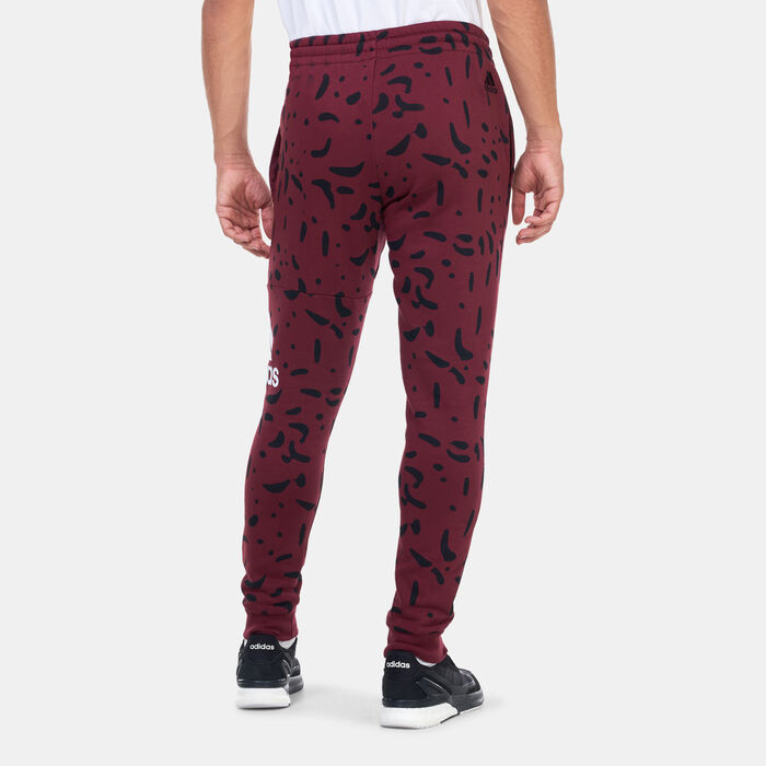 adidas Men's Essentials Allover Print Pants Red adidas Men's Essentials Allover Print Pants Red image number 1