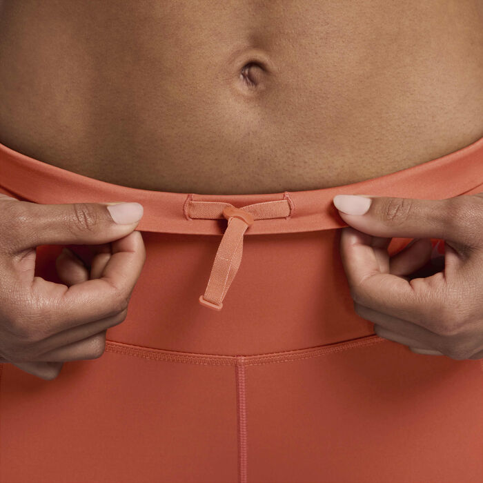 Nike Women's Go Firm-Support Mid-Rise Biker Shorts Peach image number 6