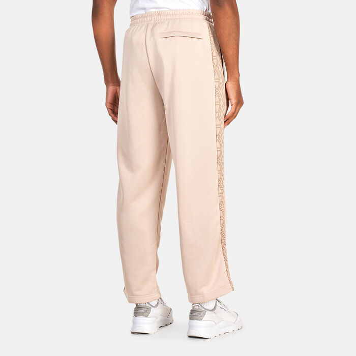 PUMA Men's T7 TREND 7ETTER Track Pants Brown image number 1